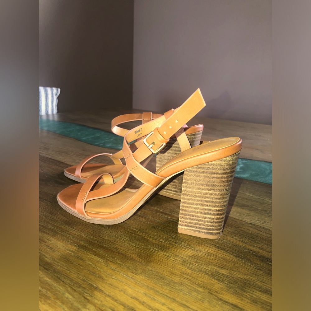 Report Carly sandals!  Never worn!